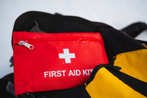 istock A vibrant red first aid kit that prominently showcases a distinct white cross symbol on its surface, ensuring easy identification and quick accessibility during emergencies when needed 2202148008