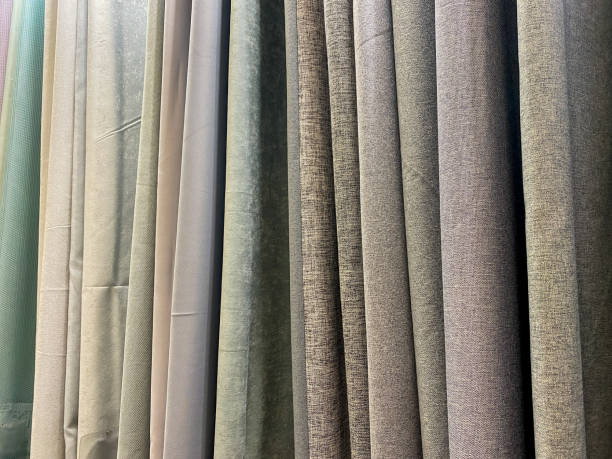 istock The elegantly displayed curtains on show effectively showcase a wide variety of unique textures coupled with vibrant colors, which capture the attention of potential customers effortlessly 2202148049