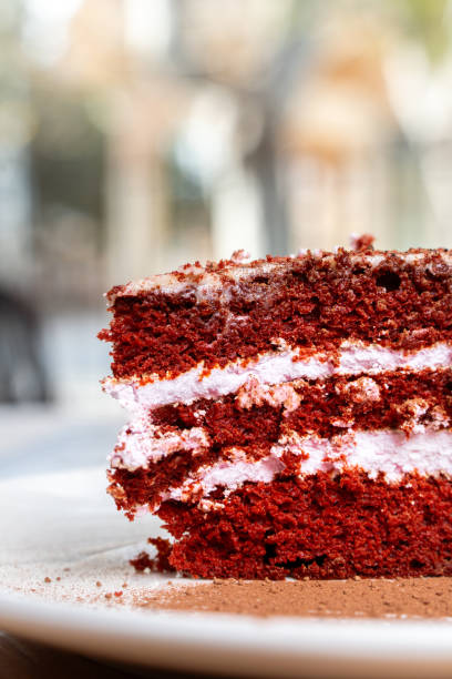 istock Red velvet cake slice with cream cheese frosting 2202149934