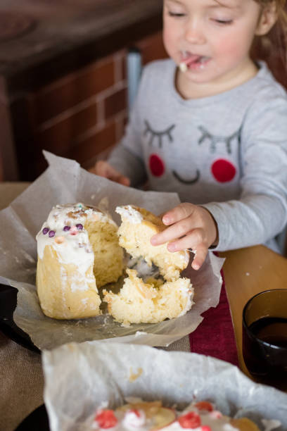 istock Joyful Easter celebration with child and festive treats 2202153039