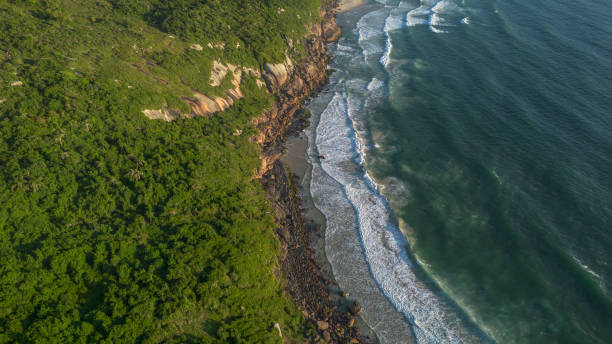 istock Set of mountains with beach and sea at dawn 2202154529