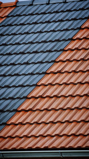 istock red roof tiles 2202157385
