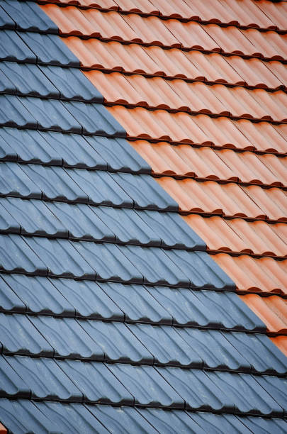 istock red roof tiles 2202157426