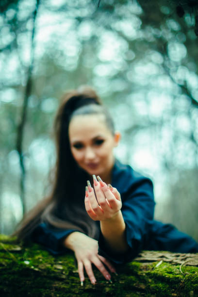 Art on her nails stock photo