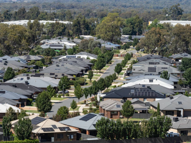 istock Suburban houses close together 2202172301