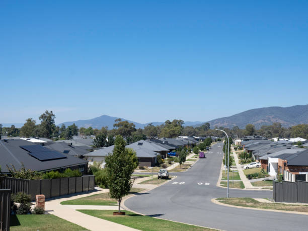 istock Suburban houses close together 2202172302