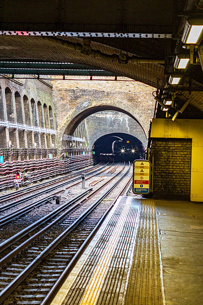 istock Underground Train Tunnel During Daytime at a Railway Station Platform 2202175757