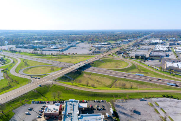 istock Urban interchange view showcasing traffic flow and surrounding developments in a sunny midday setting 2202188242