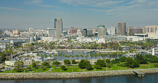 Aerial shot of Waterfront on a sunny day in Long Beach, California.\n\nAuthorization was obtained from the FAA for this operation in restricted airspace.