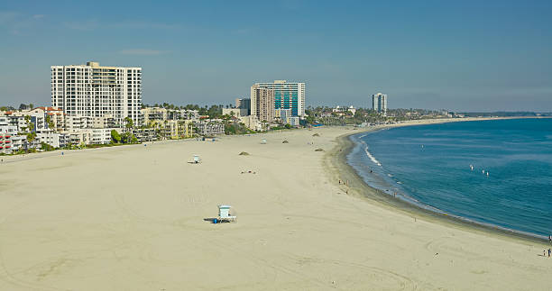 Aerial shot of Alamitos Beach on a sunny day in Long Beach, California.\n\nAuthorization was obtained from the FAA for this operation in restricted airspace.