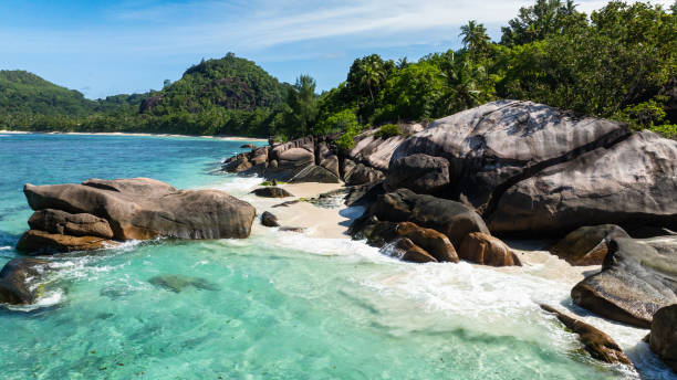 istock Vibrant blue waters and a sandy coastline. Seychelles, Mahe. 2202196495