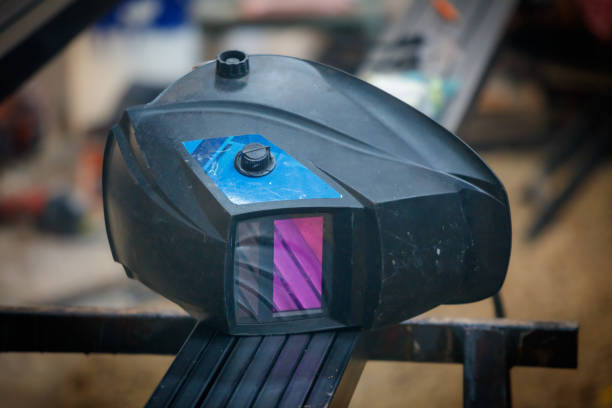 istock A black and blue helmet with a purple lens 2202207132