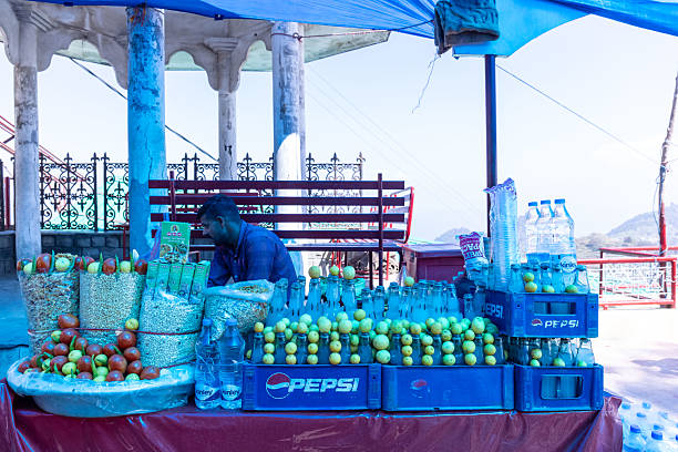 Naina Devi, Himachal Pradesh, India - March 2022: View of local market at naina devi with shopkeeper at shop selling their products. Naina devi is a holy place to worship goddess naina devi.