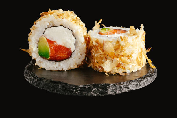 istock traditional Japanese sushi on a black background 2202208542