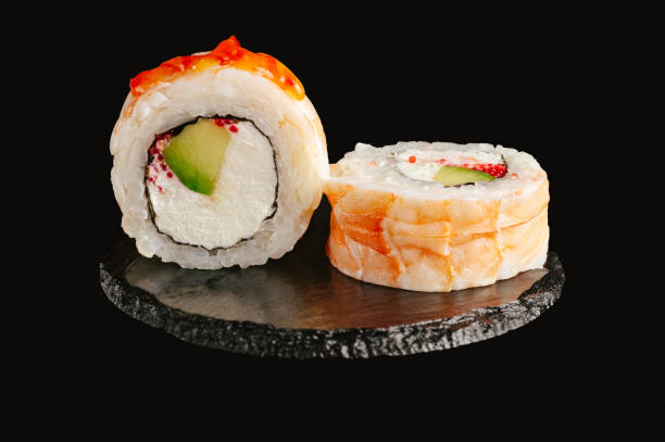 istock traditional Japanese sushi on a black background 2202208586