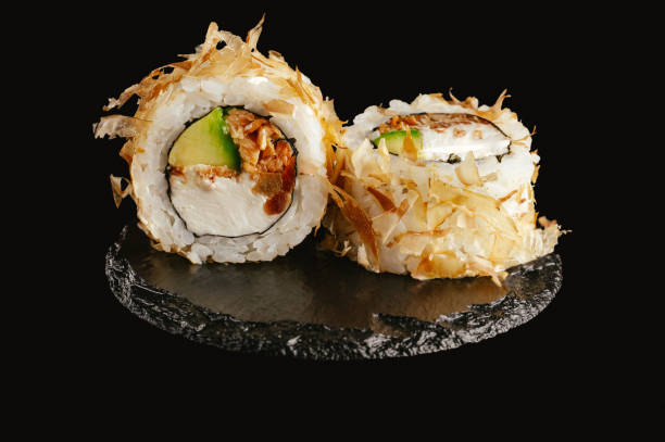 istock traditional Japanese sushi on a black background 2202209291