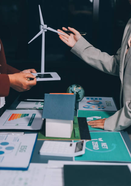 istock Carbon offset price report CO2 emission. Future growth Net zero waste in ESG ethical SME office protect climate change global warming social issues project. Group of asia people Eco friendly SDGs plan 2202212888
