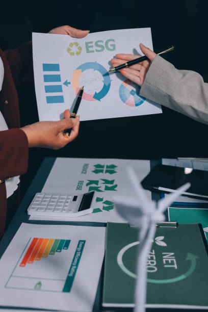 istock Carbon offset price report CO2 emission. Future growth Net zero waste in ESG ethical SME office protect climate change global warming social issues project. Group of asia people Eco friendly SDGs plan 2202212905