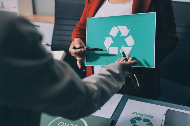 istock Carbon offset price report CO2 emission. Future growth Net zero waste in ESG ethical SME office protect climate change global warming social issues project. Group of asia people Eco friendly SDGs plan 2202212926