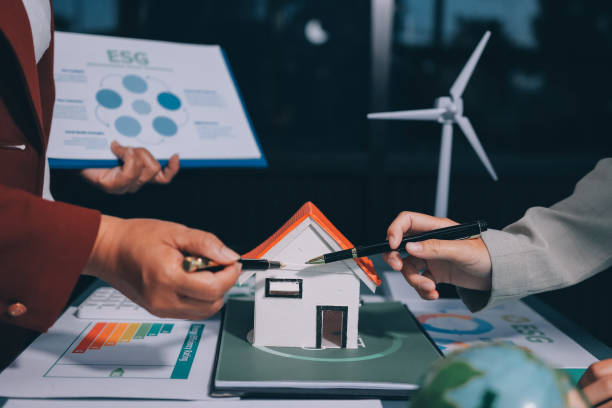 istock Carbon offset price report CO2 emission. Future growth Net zero waste in ESG ethical SME office protect climate change global warming social issues project. Group of asia people Eco friendly SDGs plan 2202212940