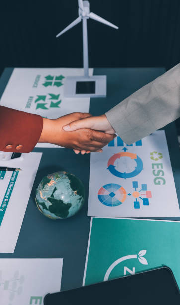 istock Carbon offset price report CO2 emission. Future growth Net zero waste in ESG ethical SME office protect climate change global warming social issues project. Group of asia people Eco friendly SDGs plan 2202212954