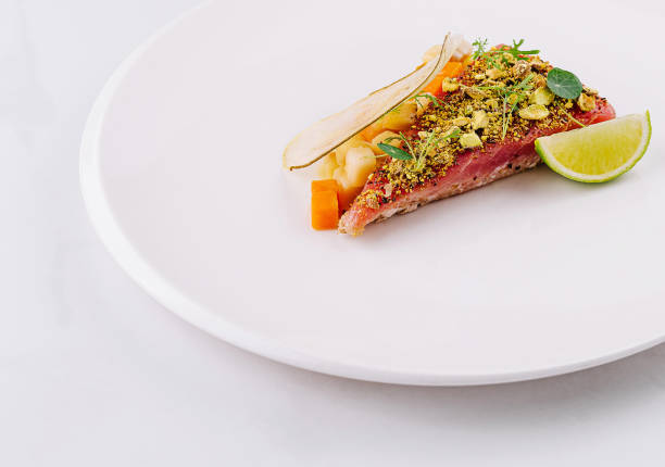 istock Gourmet tuna tartare with fresh herbs and lime 2202213428