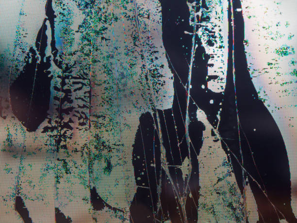istock Close-up of broken LCD LED screen showing pixel distortion and texture, creating a digital drama effect. 2202217627