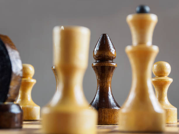 istock Chess pieces on the board with selective focus, creating an atmosphere of strategic play and intellectual confrontation. 2202217738
