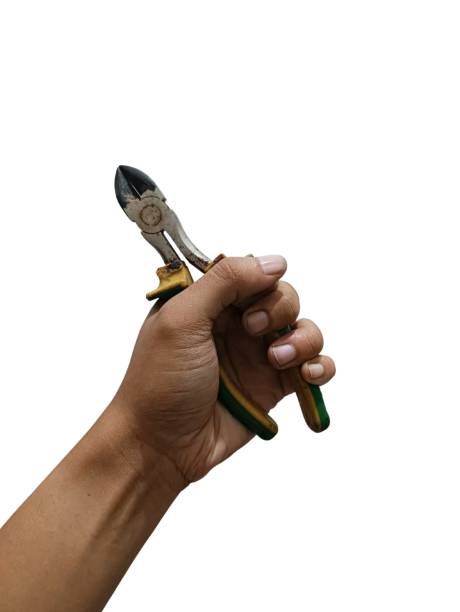 istock Hand of a man holding cutting pliers. 2202218639