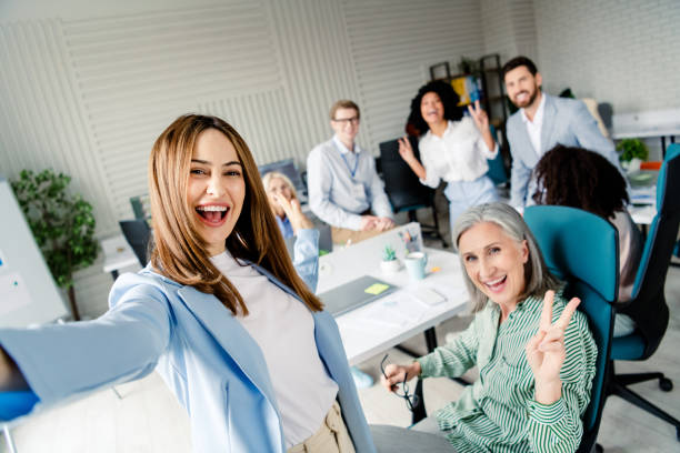 istock Diverse colleagues sharing teamwork in a productive office atmosphere 2202228240