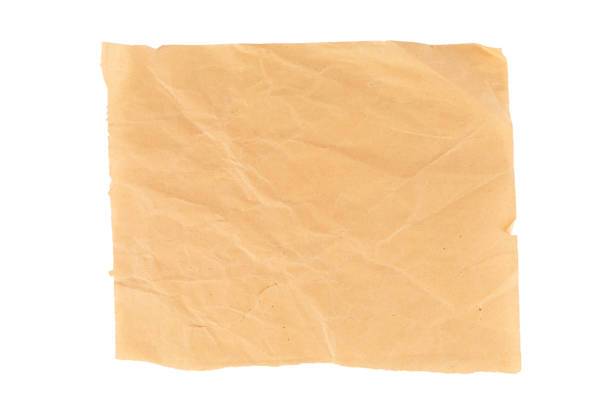 Brown crumpled paper isolated on white background cutout. High quality photo