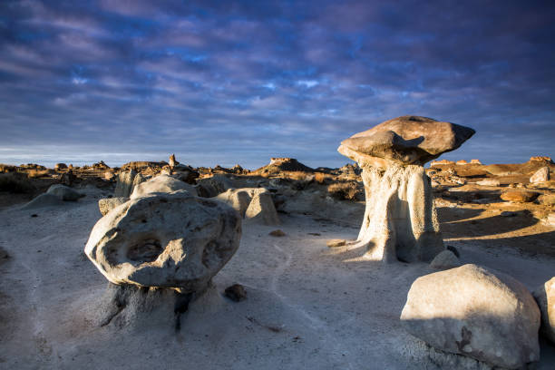 Sunrise over the dramatic rock formations of the Bisti Badlands in New Mexico