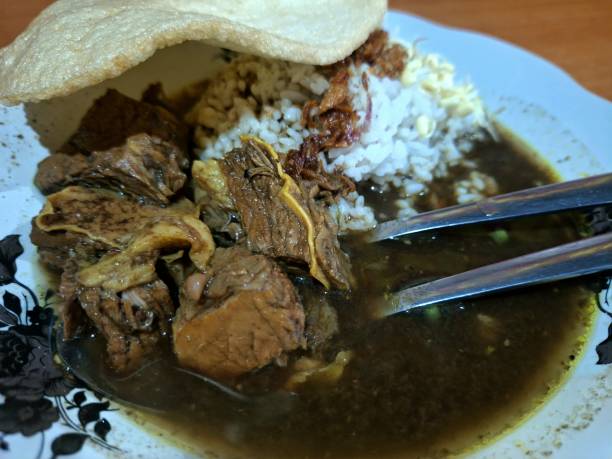 istock Delicious Rawon With Rice and Crackers 2202234320