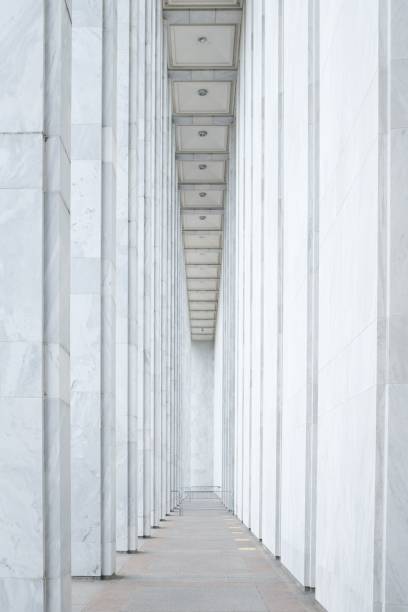 istock A striking perspective of a grand marble corridor. 2202238728
