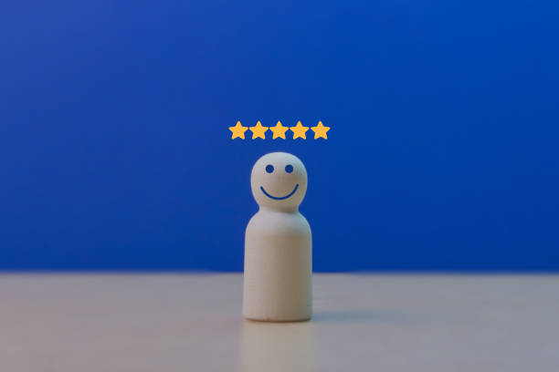 istock Wooden dolls that customers give five star rating 2202240198