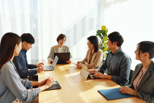 istock Asian Business People Having A Meeting 2202240623