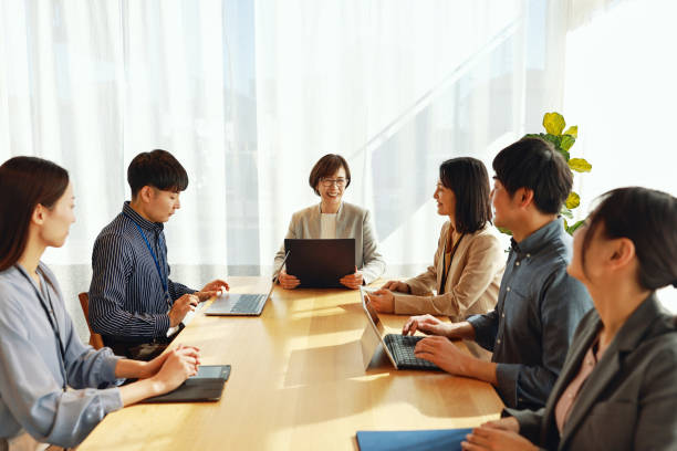 istock Asian Business People Having A Meeting 2202240664