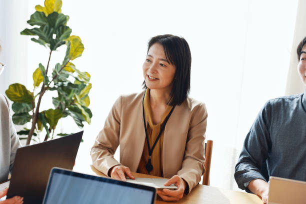 istock Asian Business People Having A Meeting 2202240686