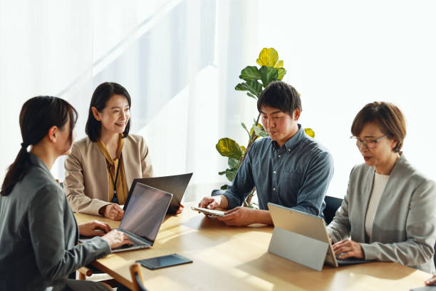 istock Asian Business People Having A Meeting 2202240716