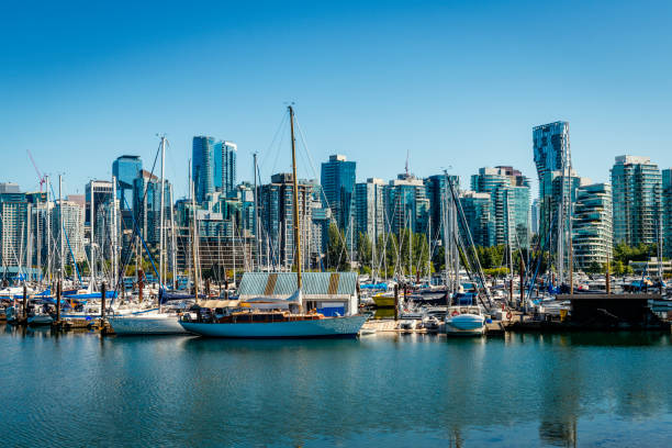 sailing ships and skyscraper in Vancouver in Canada