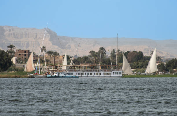 istock Large egyptian river cruise dahabeya boat moored on Nile 2202252245