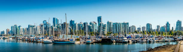 istock sailing ships and skyscraper in Vancouver in Canada 2202257337