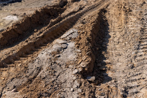 istock a deep hole in the ground on the site of which a highway was started 2202257656