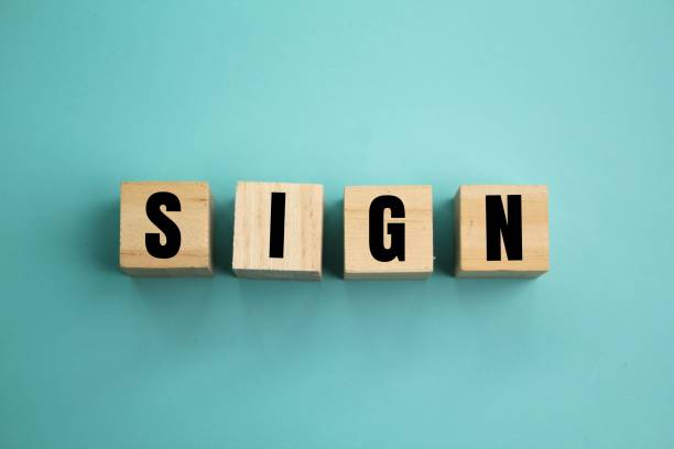 istock wooden cube sign word. an object, quality, or event whose presence or occurrence indicates the probable presence or occurrence of something else. 2202261475