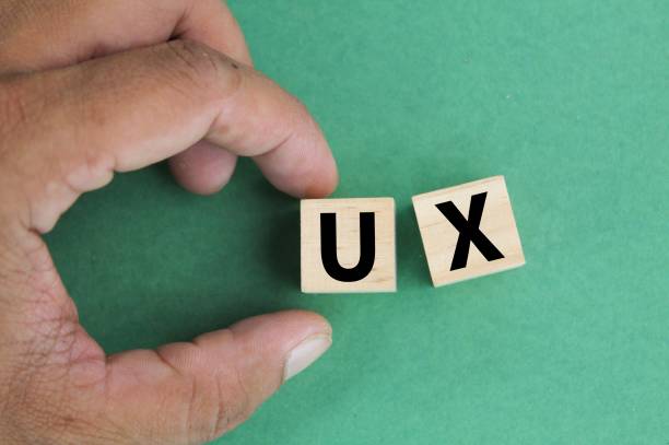 istock wooden cube with the letters UX or the word User Experience 2202262202
