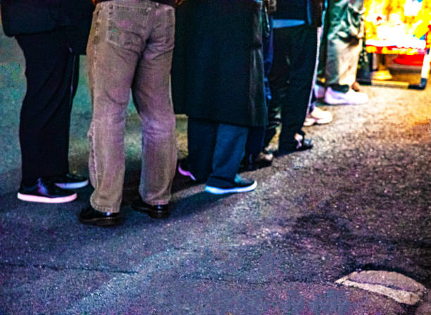 istock People waiting in line at a ramen restaurant 2202264019