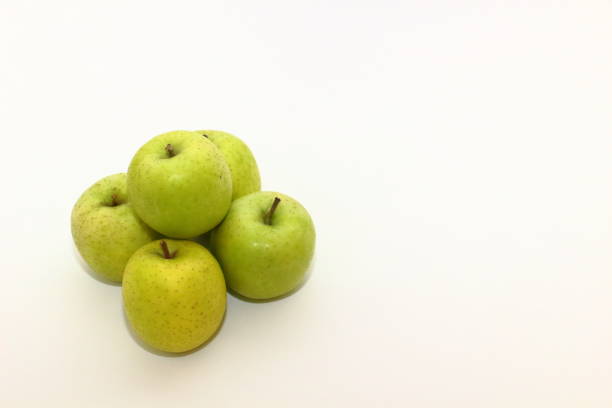 gold apples on a white background