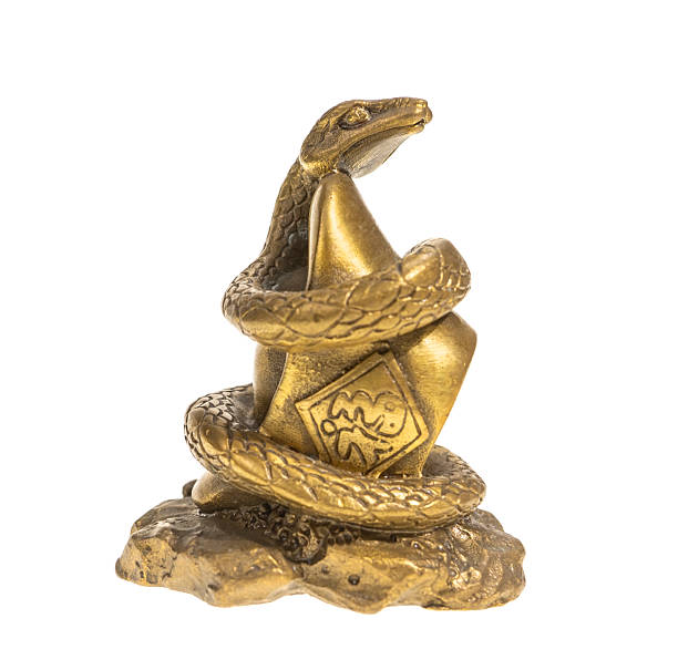 istock chinese new year concept with traditional snake statue isolated on white background 2202265251