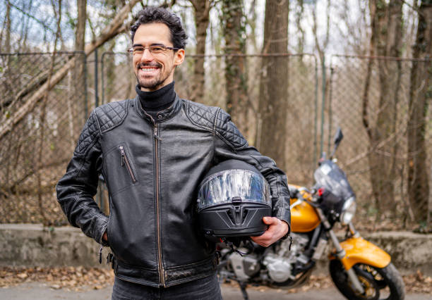 istock Young motorcyclist in a leather jacket 2202266987
