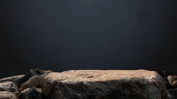 istock Rock podium stand display product, Stone stage show cosmetics with studio blue light wall room background well free space for text advertising, Cliff Brown stone clipping path 2202269805